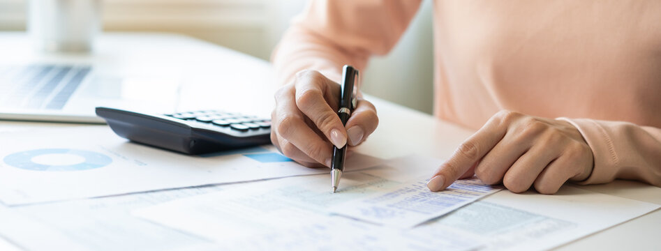 Deduction planning, debt asian young woman calculating money balance of finance from bill and income, cost budget expenses for pay money form personal individual on table at home. Financial concept.
