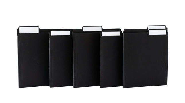 Black paper folders with white identification tabs arranged on png background files