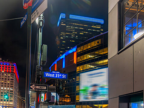 Manhattan buildings illuminated at night with Madison Square Garden
