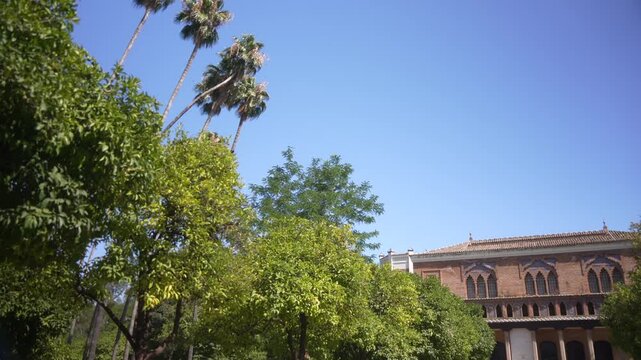 View of Museum of Popular Arts and Customs of Seville in Parque de Mari&shy;a Luisa on a sunny day, Seville, Andalusia, Spain