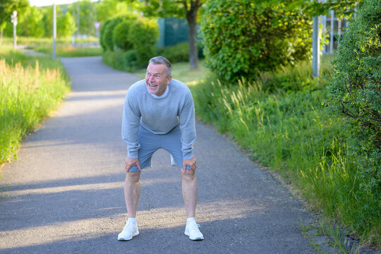 Senior Runner Resting After Training