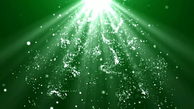 Green christmas tree made of glowing particles with light rays background, holiday