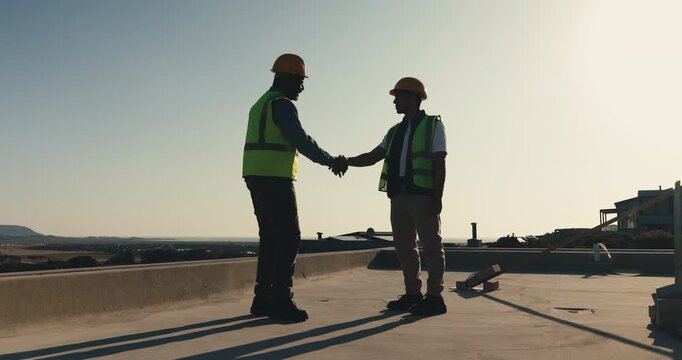 Team, men or handshake on rooftop for construction, trade handoff or structural approval of building. Engineer, foreman or shaking hands for phase completion, site inspection or concrete slab finish