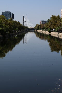 Scenic Dambovita River Flowing Through Bucharest