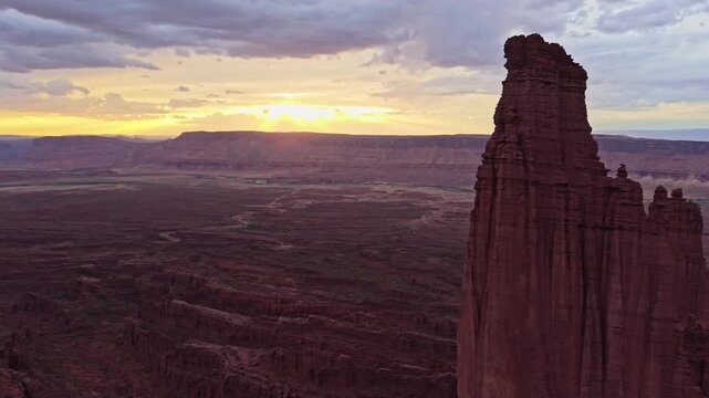 Aerial sunset view overlooking scenic valley from towering Fisher Towers