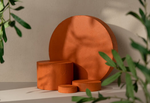 Three terracotta textured cylinder product display podiums  for cosmetic product presentation scene.