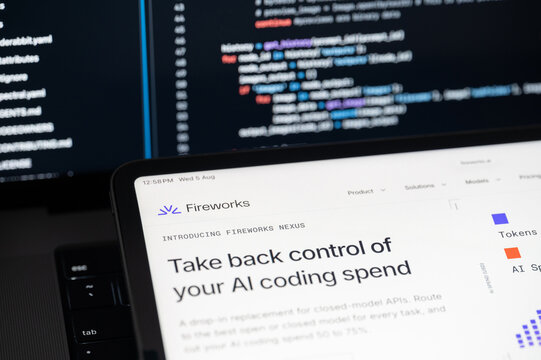 Fireworks Ai company web page on program code background