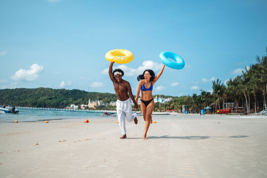 Couple enjoying their tropical vacation with peace of mind, secured by reliable travel insurance