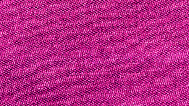 Magenta denim fabric texture background for fashion and apparel design