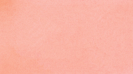 Peach pink velvet fabric texture close up with fine soft structure © Top_Stock