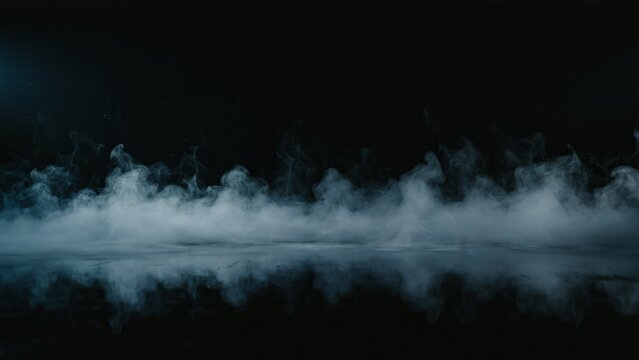 Low-lying fog and mist skimming across a dark surface, creating a mysterious and atmospheric effect.