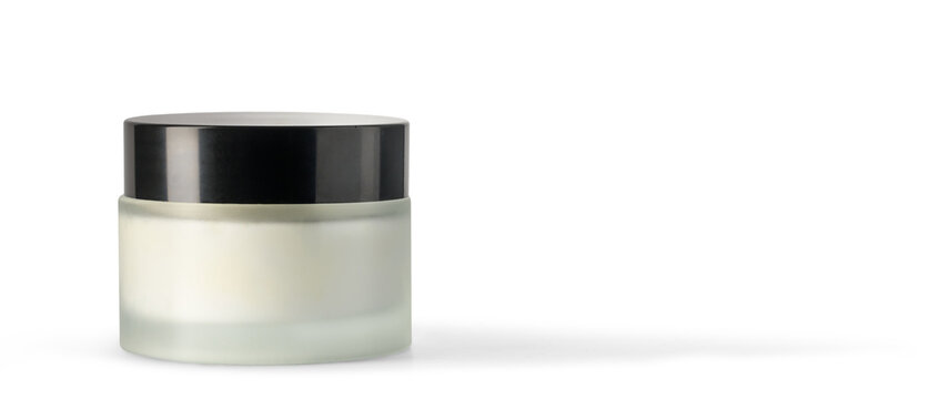 Luxury cream jar with black lid on white background, cosmetic, skincare context