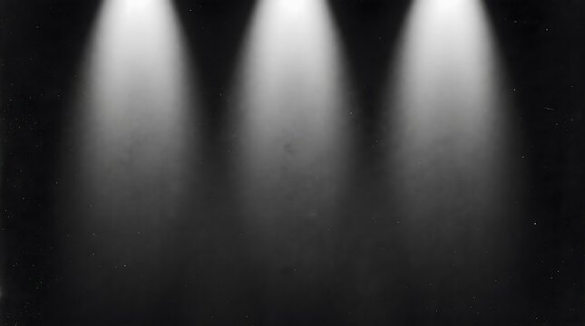 Triple Studio Downlight Beams on Dark Monochrome Grainy Film Texture Background