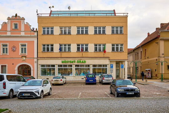 Small town city hall with parking and historic architecture. March 17, 2026 Vysoke Myto, Czech Republic