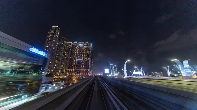 dubai downtown from the dubai metro train at night