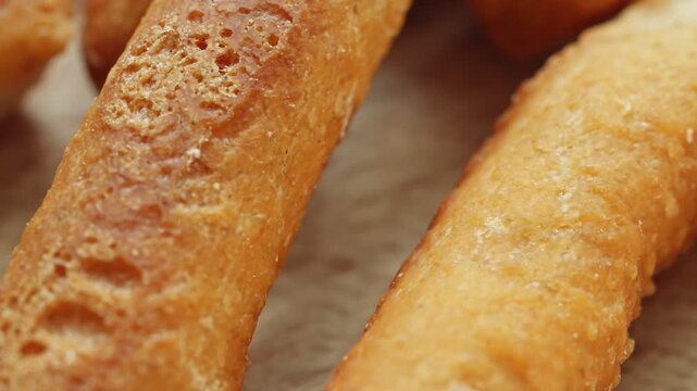 Mini bread sticks presentation macro close up presentation slowly rotating stock footage
