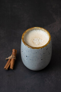 Pumpkin latte and cinnamon. Warm drink during cold weather