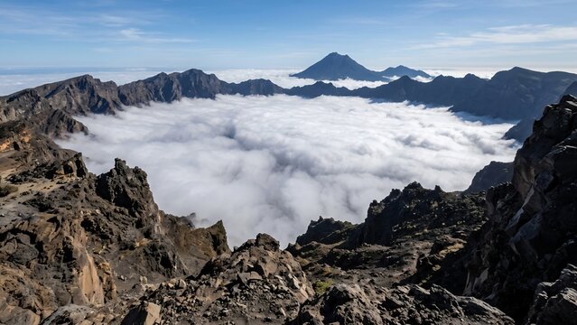 Massive Volcanic Caldera Filled With a Dense Sea of Rolling Clouds