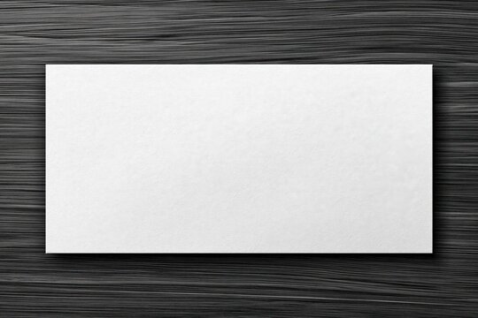 Blank white DL mockup template on textured dark wood background