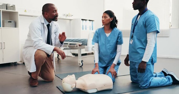 Dummy, cpr and doctor with students for teaching first aid, safety protocol and medical support. Healthcare, class and man with people in paramedic course for cardiac arrest, rescue or emergency care