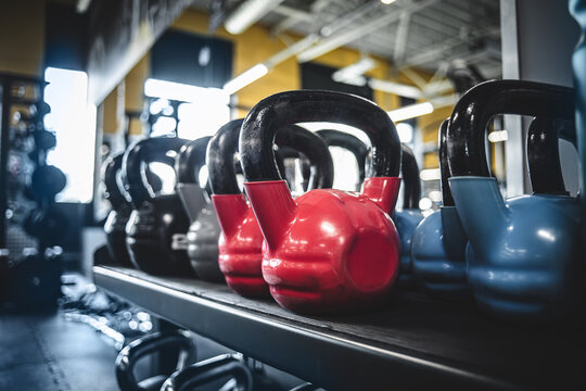 Kettlebells Arranged By Weight In A Gym, Equipment For Functional Training