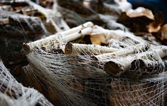 Close-Up View Of Firewood Bundles Ideal For Grills And Barbecues