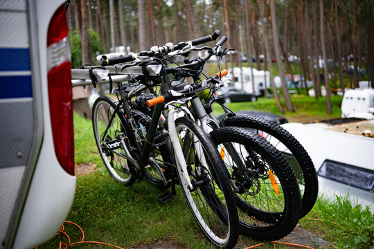Bikes Ready For A Family Bike Journey After The Rain In The Forest Near Camper At A Campsite