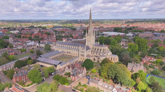 A pullback drone view of Norwich Cathedral. An 11th century building in Norfolk, UK