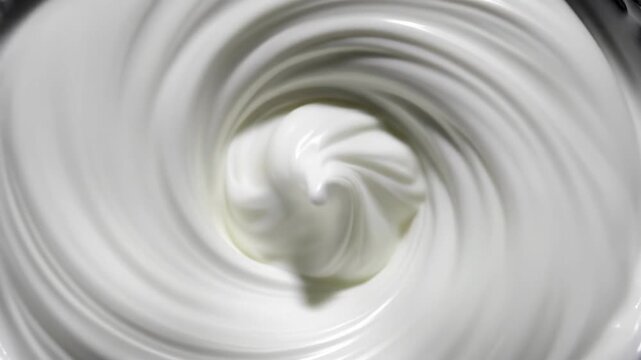 Creamy white food texture formation abstract whirlpool background