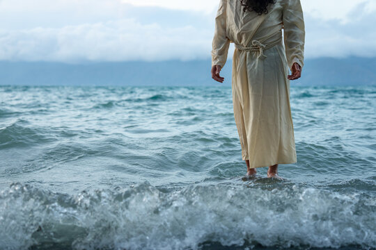 Jesus walks on water, divine miracle, biblical scene.