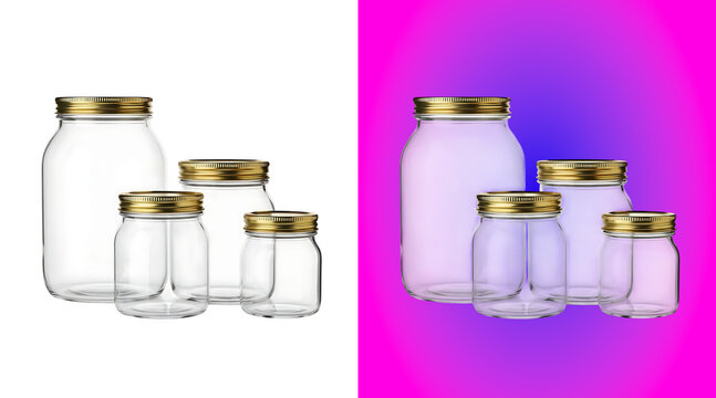 Collection of four empty clear glass jars of different sizes with gold metal lids, isolated on a white background, for kitchen storage