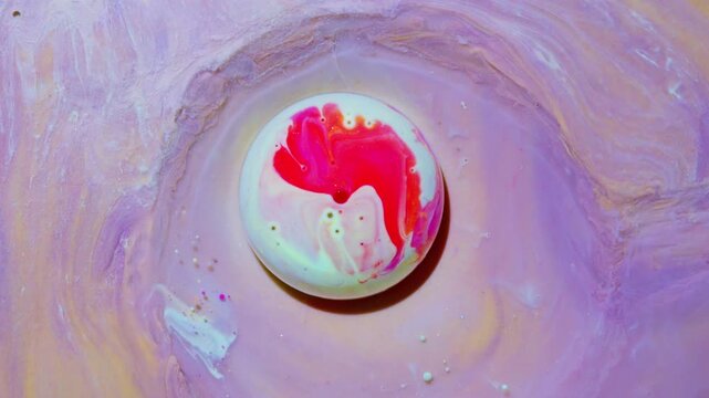 Glossy Liquid Droplet with a Red Swirl on Lavender, Abstract 4K Video Background
