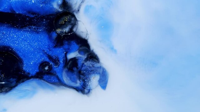 Dark Blue Liquid Swirls in a Pale Blue Fluid, Abstract 4K Video Background
