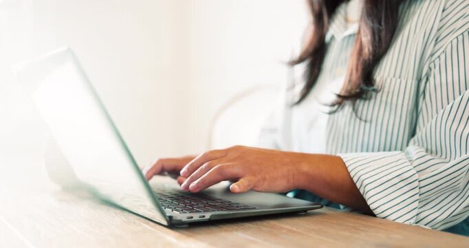 Hands, woman and typing on laptop in home to start project, research and online review for blog. Freelancer, person and open computer for website content, copywriting and article for remote work
