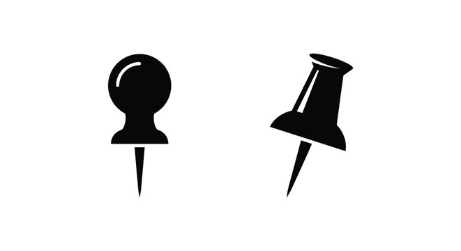 Two black silhouettes of push pins against a white background