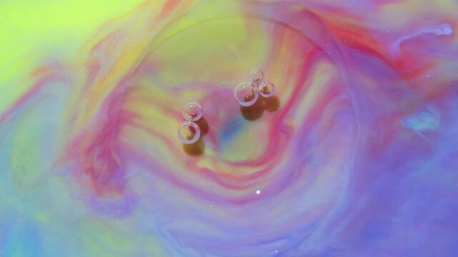 Pastel Liquid Swirls with Small Bubbles in Pink and Yellow, Abstract 4K Video Background