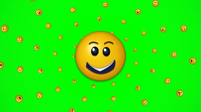 Large smiling emoji face icon surrounded by many smaller floating expressive emoticon heads isolated on vibrant green screen background.