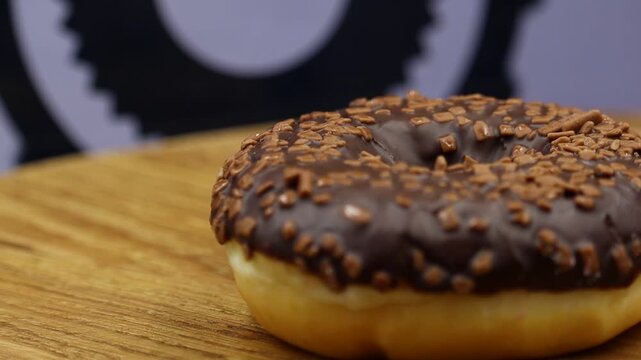 MVI chocolate glazed donut close up.