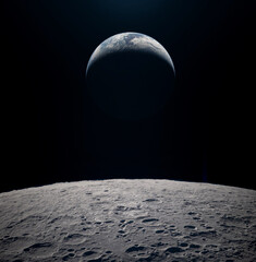 A view of planet Earth from the cratered surface of the moon.  Elements of this image furnished by NASA. © Tryfonov