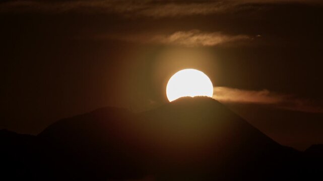 Golden sunrise over pico de orizaba volcano mountain