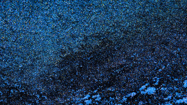 Mixing alcohol ink in macro view during artistic process in studio setting