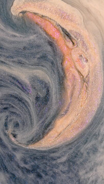 Mixing alcohol ink creates colorful swirls in abstract patterns