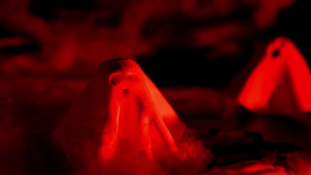Atmospheric Halloween concept designed for seasonal greetings announcements or promotional messages combining handmade clay ghosts with classic spooky decorations to symbolize mystery, celebration