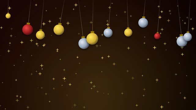 Christmas baubles swinging on dark background with stars