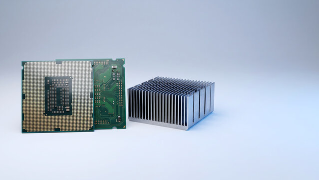 密なフィンを重ねた冷却用ヒートシンクと剥き出しの回路基板を並べて捉えた精密な接写