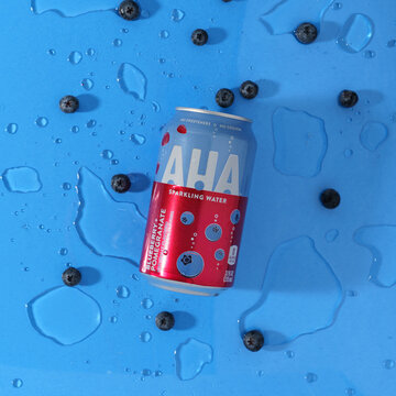 Can of AHA Sparkling Water in blueberry pomegranate flavor on August 29, 2021 in Yucca Valley, California