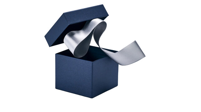 Isolated elegant open navy blue gift box with flowing metallic silver ribbon