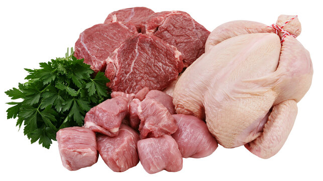 Isolated assortment of fresh raw beef steaks, cubed pork meat, whole chicken, and green parsley