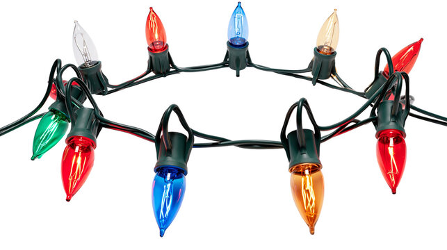 Isolated classic colorful holiday string lights with incandescent electric bulbs for festive decoration