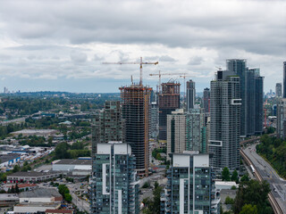Construction Skyline Over Burnaby High-Rise Towers With Cranes and Cloudy Sky in Greater Vancouver © edb3_16
